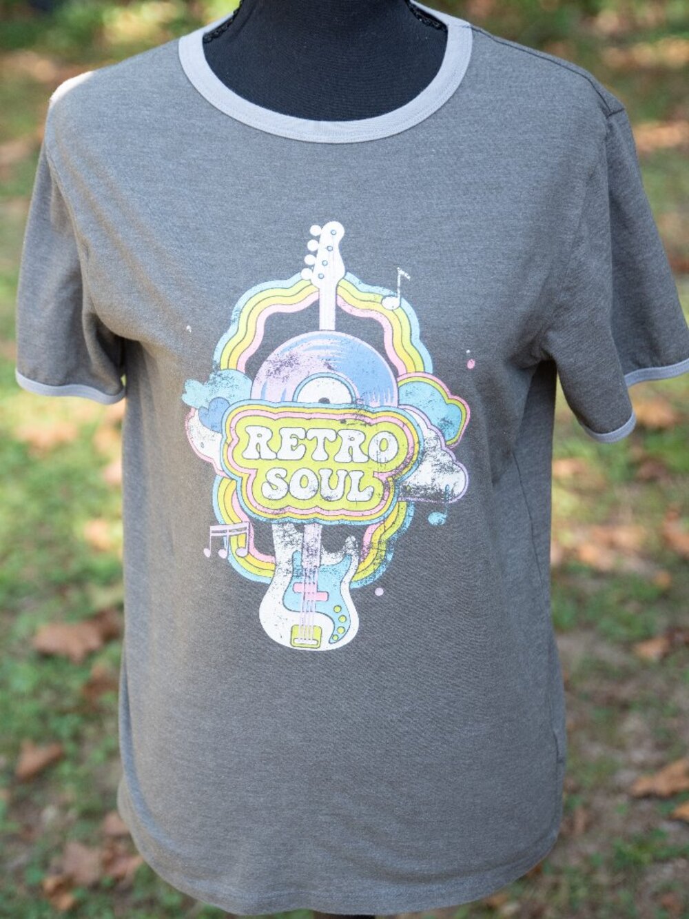 Gray distressed women's size small T-shirt featuring a colorful "Retro Soul" gra